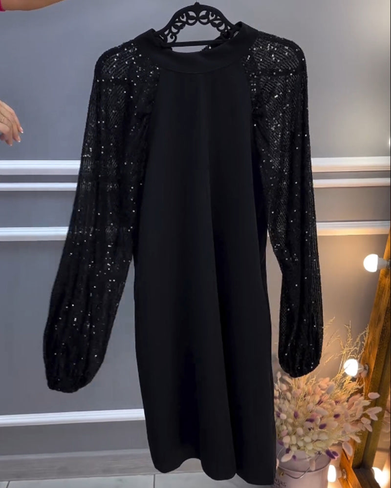 Solid color dress with patchwork sleeves