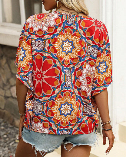 Retro printed V-neck button half sleeve blouse