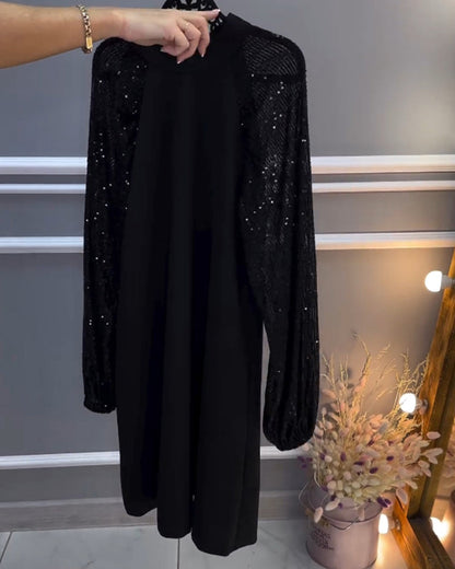 Solid color dress with patchwork sleeves